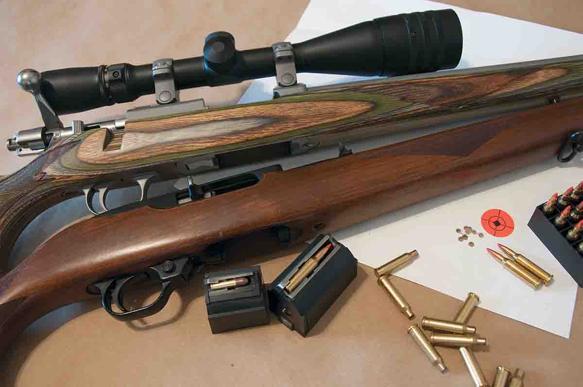 The laminated stock on the Ruger 77/17 (top) is both stiff and heavy, but it does not have the look and feel of the walnut stock on the Ruger 10/22 Sporter.